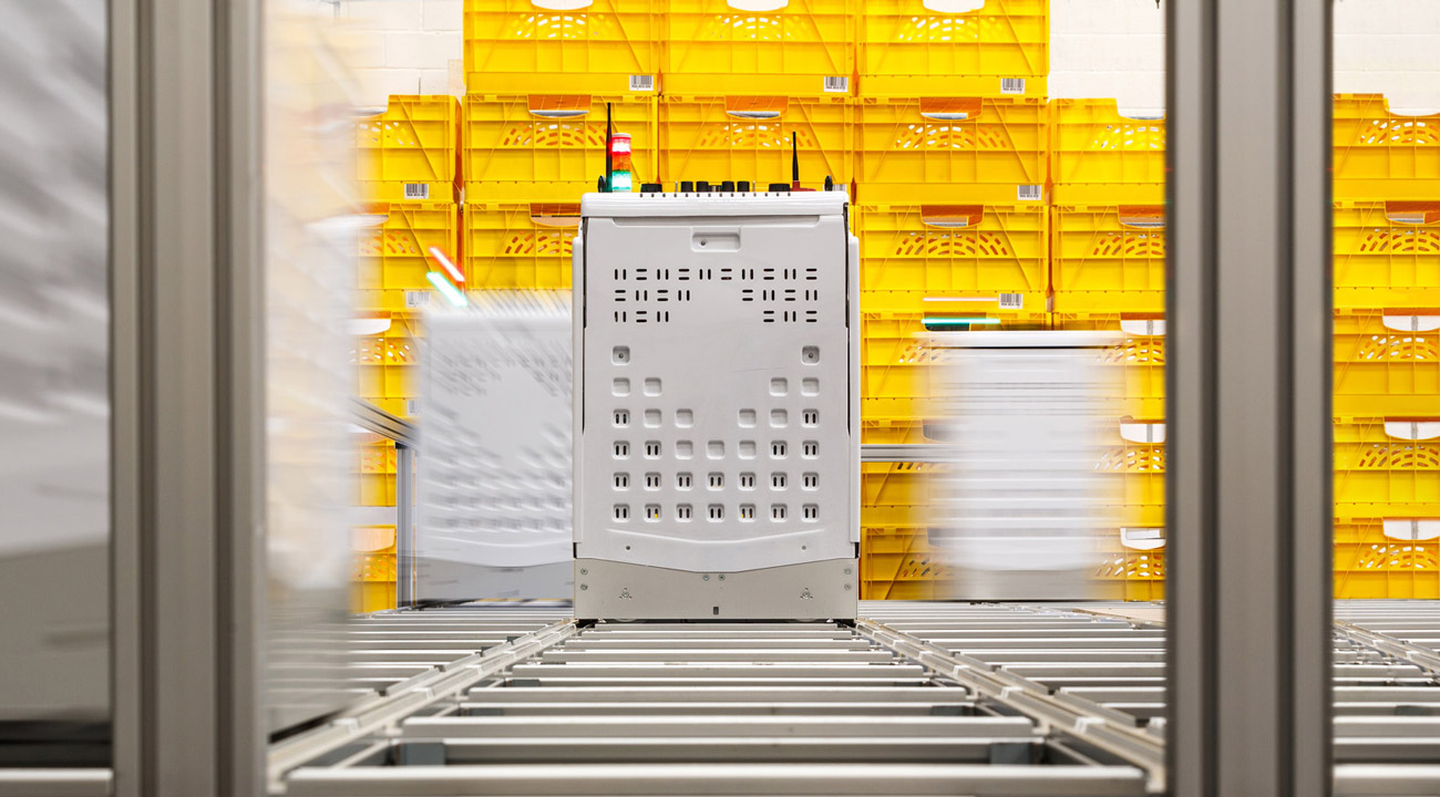 Ocado bot in automated warehouse