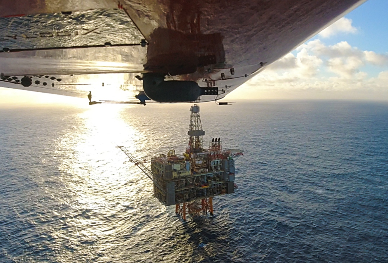 Flylogix drone camera feed showing flight to off-shore oil rig